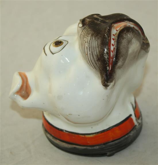 A Staffordshire porcelain bulldogs head table snuff box, c.1860, length 11.5cm, slight wear to the enamels